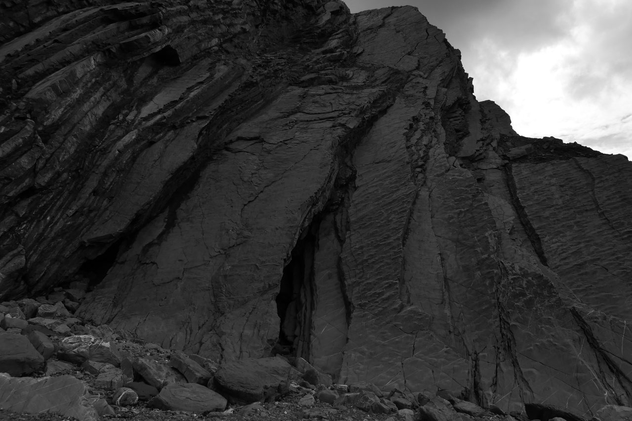 Rock Face. A wall of folded rock above the beach.