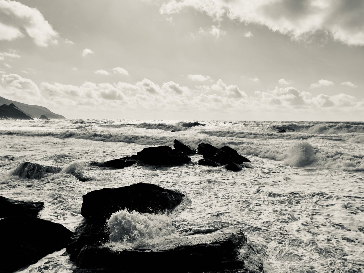 Rough Water. Waves breaking over the rocks.